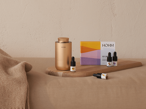 self care essential oils on bed